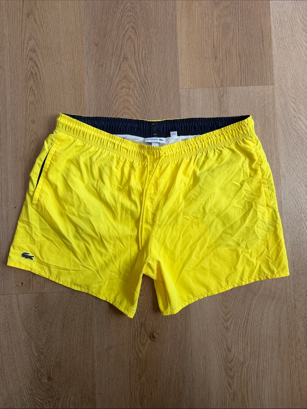 Lacoste Yellow Swim Trunks with alligator patch